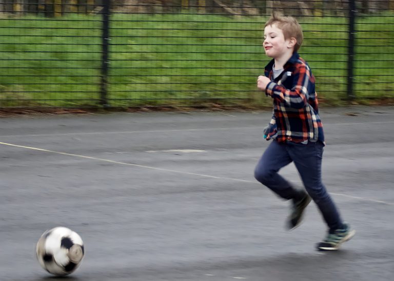 Boy playing football